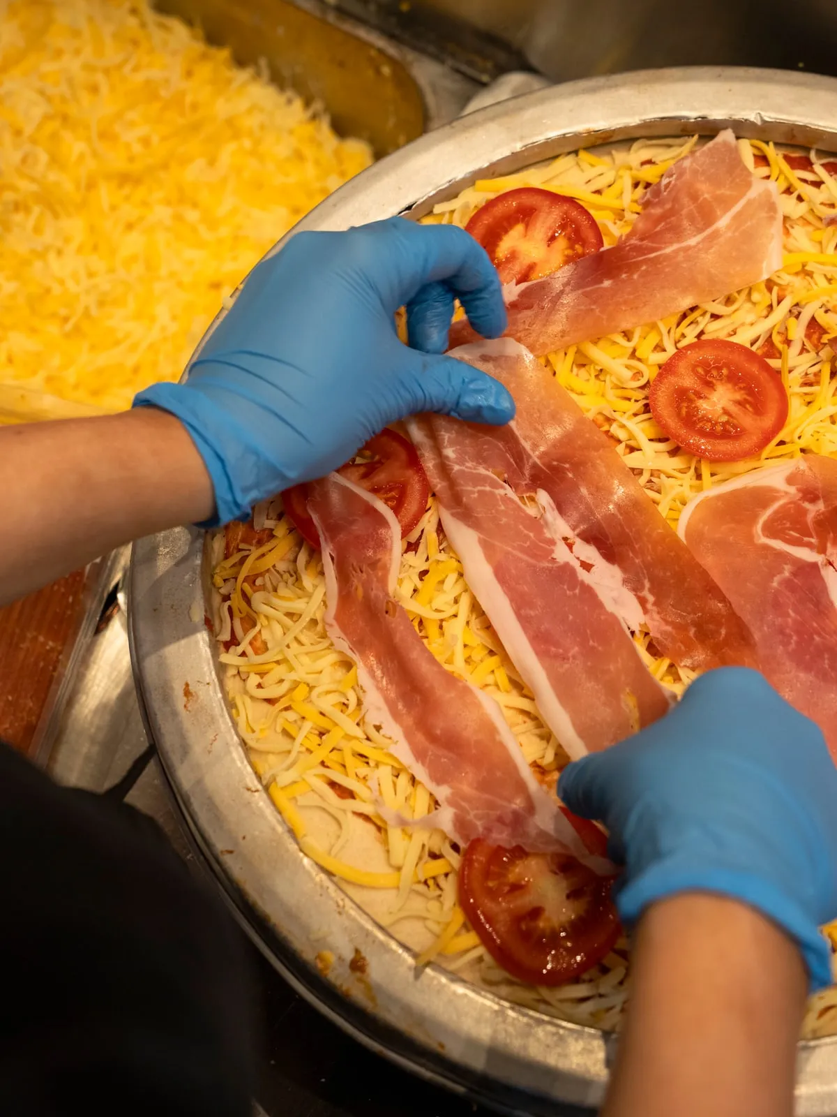 Every topping goes on by hand.